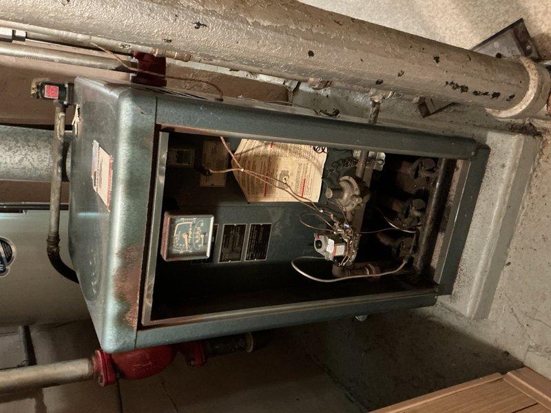 Responded to service call for boiler with pilot light repeatedly extinguishing. Upon inspection, diagnosed faulty thermocouple causing pilot safety system to shut down. Cleaned pilot assembly, tested flame sensor operation, and verified proper gas pressure at pilot orifice. Adjusted pilot flame height and confirmed stable ignition. Inspected burner assembly, heat exchanger access panels, and all associated piping and valves for proper operation. System tested through multiple heating cycles with pilot remaining lit and burner firing correctly. Unit restored to full operational status.