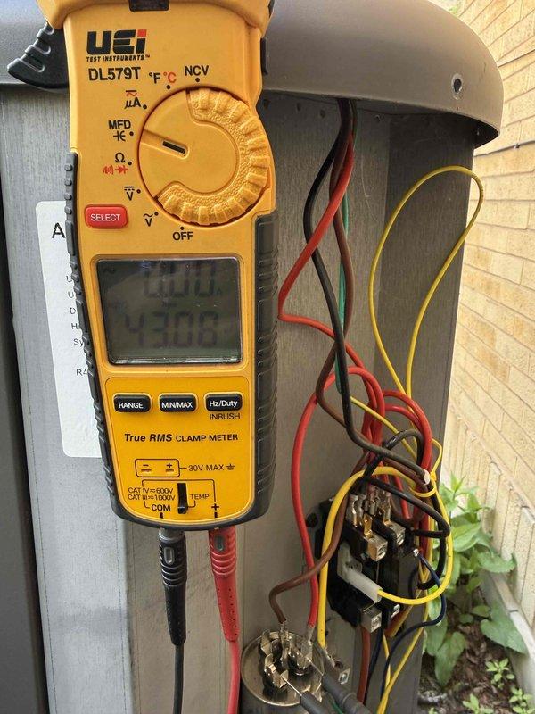 Completed comprehensive clean and check maintenance service on Napoleon brand residential air conditioning system per Comfort Plan agreement. Performed electrical diagnostics using digital clamp meter to verify proper amperage draw and system performance, tested all electrical connections and components including capacitor operation. Inspected outdoor condenser unit, confirmed proper operation of fan assembly, and verified adequate clearance from surrounding vegetation and landscaping.