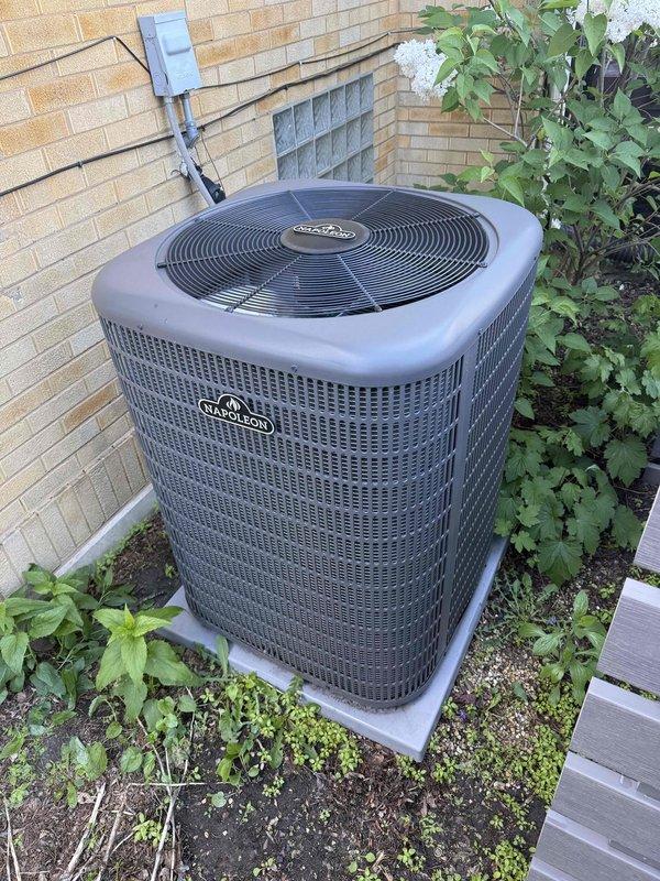 Completed comprehensive clean and check maintenance service on Napoleon brand residential air conditioning system per Comfort Plan agreement. Performed electrical diagnostics using digital clamp meter to verify proper amperage draw and system performance, tested all electrical connections and components including capacitor operation. Inspected outdoor condenser unit, confirmed proper operation of fan assembly, and verified adequate clearance from surrounding vegetation and landscaping.
