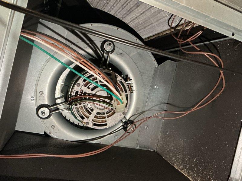 Completed comprehensive clean and check maintenance on single HVAC system per comfort plan agreement. Performed thorough inspection of air handler blower motor assembly, verified proper operation and electrical connections, tested capacitor readings at outdoor unit junction box showing 9 microfarads, and documented system condition with photos. All components found operating within normal parameters with no immediate service needs identified.