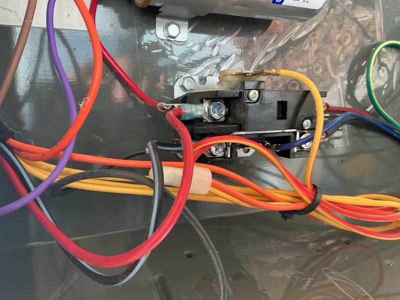Completed annual air conditioning clean and check per Gold Comfort Plan maintenance agreement. Performed comprehensive system inspection including electrical connections, contactor operation, and amperage readings. Measured compressor amperage at 6.36 amps, which is within normal operating parameters. Verified all wire connections are secure and properly terminated at contactor and equipment terminals. System operating efficiently with no deficiencies noted.