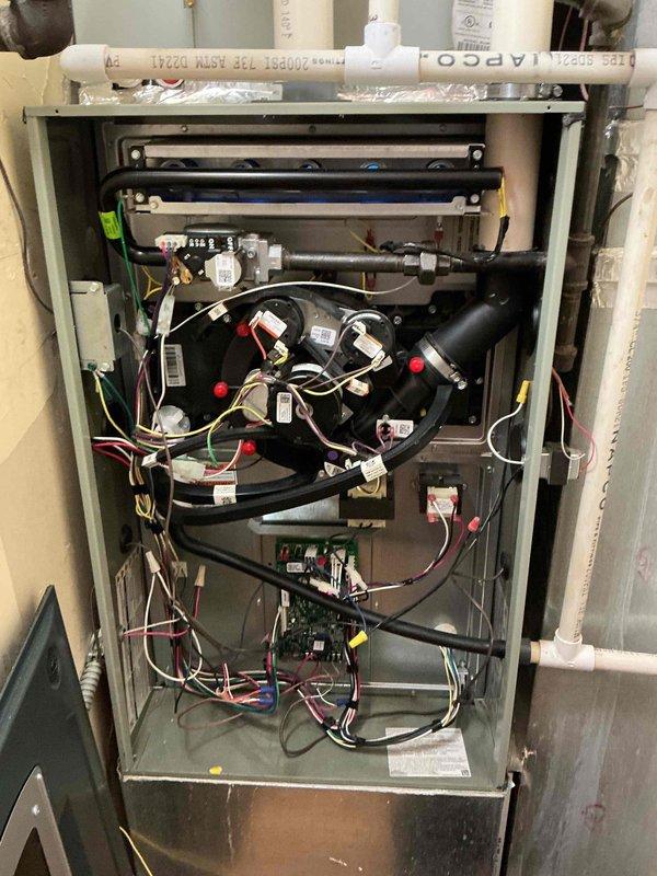 Completed comprehensive Clean and Check maintenance service on single HVAC system including furnace, water heater, and humidifier per comfort plan agreement. Performed full system inspection, cleaned all components, verified proper operation of heating equipment and accessories, and documented system conditions with interior cabinet and thermostat readings showing 72°F temperature and 39% humidity levels.