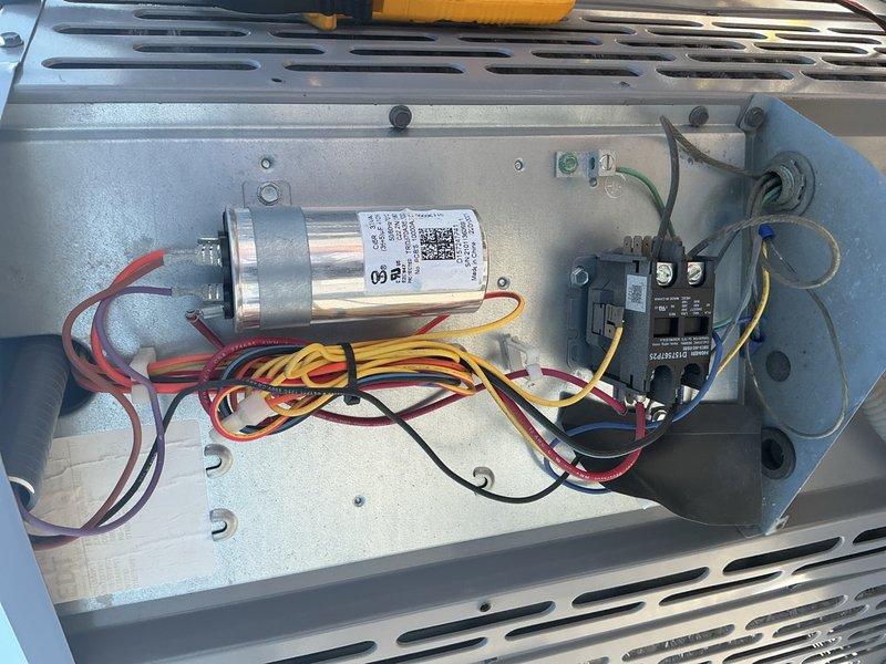 Completed comprehensive air conditioning and air handler maintenance per building specifications. Performed full system inspection including electrical components, capacitor testing, contactor operation verification, and evaporator coil examination. All components found operating within normal parameters, connections secured, and system left in proper working condition.