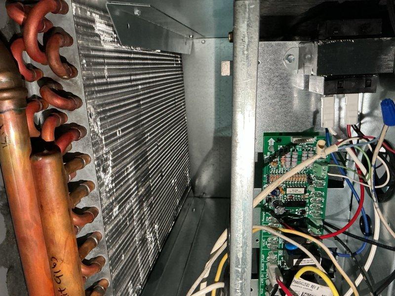 Completed comprehensive air conditioning and air handler maintenance per building specifications. Performed full system inspection including electrical components, capacitor testing, contactor operation verification, and evaporator coil examination. All components found operating within normal parameters, connections secured, and system left in proper working condition.