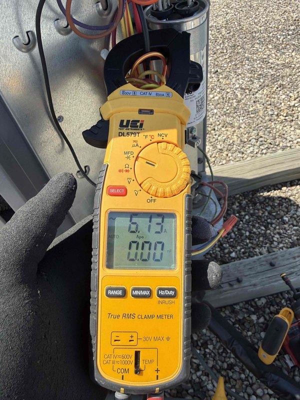 Performed comprehensive tune-up and diagnostic evaluation on single HVAC system per building specifications. Conducted electrical measurements using clamp meter, recording compressor amperage at 4.50A and fan motor draw at 6.12A, both within manufacturer specifications. Inspected capacitor connections, verified proper wire terminations, and confirmed all electrical components operating safely under rated voltage parameters.