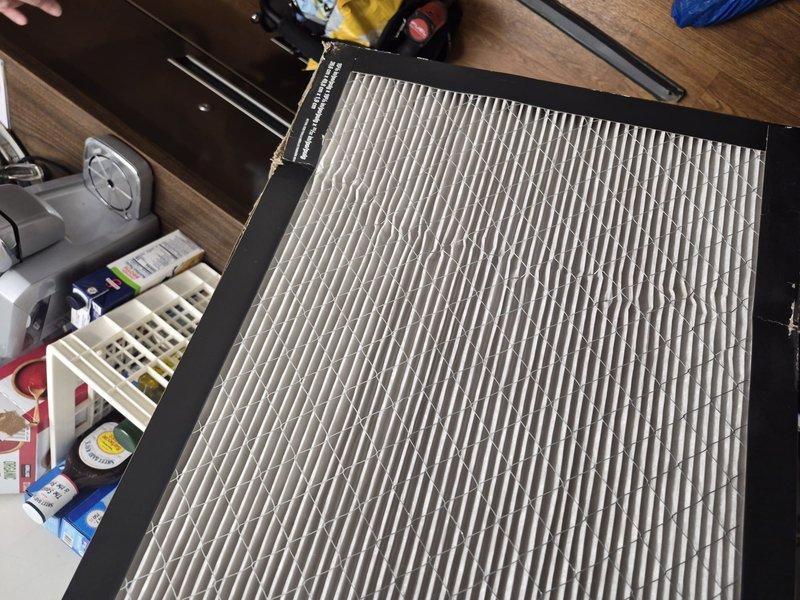 Completed comprehensive tune-up maintenance on HVAC system per building requirements. Performed standard inspection of air handler components including blower assembly and internal mechanisms, confirming proper operation and cleanliness. Installed customer-provided air filter with pleated media into system, replacing previous filter that showed moderate dust accumulation and discoloration from normal service use.