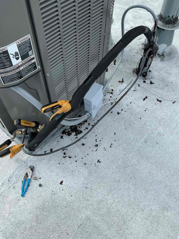 Completed comprehensive clean and check maintenance service on rooftop HVAC system per comfort plan agreement. Performed standard inspection procedures, verified refrigerant line temperatures reading 45°F at suction line, and ensured all mechanical components operating within manufacturer specifications.