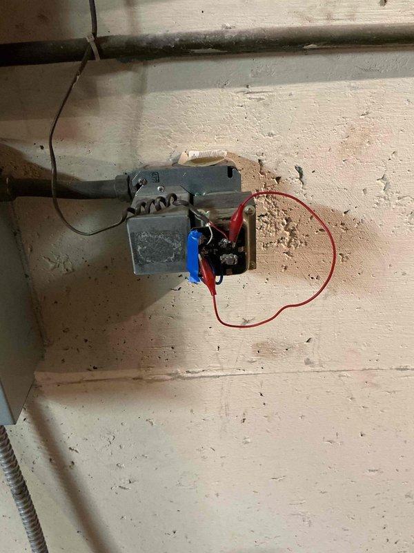 Responded to service call regarding unusual noise from boiler pump in main office area. Upon inspection, identified circulator pump assembly exhibiting abnormal operational sounds. Performed diagnostic assessment of pump motor, electrical connections, and relay components. Documented equipment condition with photographs showing pump assembly, associated wiring, and control components for approval process with property management.