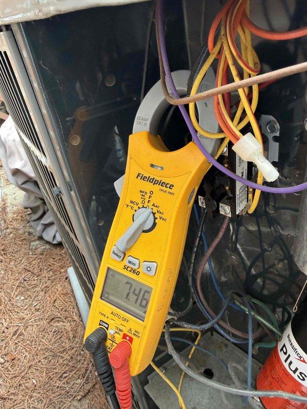 Completed Comfort Plan maintenance on two air conditioning systems. Performed comprehensive clean and check procedures on both units, including electrical diagnostics using digital multimeter to verify proper voltage readings and current draw measurements. All components tested within normal operating parameters, systems operating efficiently with no issues identified.