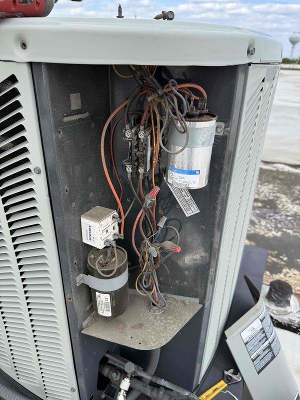 Performed commercial HVAC maintenance per agreement on furnace and hanging heater unit. Completed clean and check procedures, replaced 16x25x1 air filter, and conducted electrical diagnostics using multimeter to verify capacitor performance and system operation. Noted air conditioning unit requires agreement renewal for service continuation.