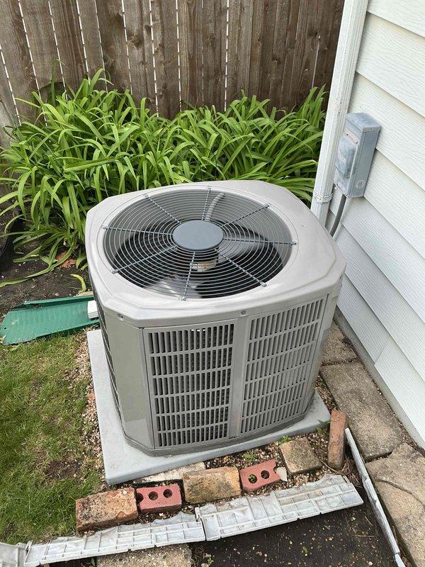 Completed air conditioning clean and check maintenance service per Gold Comfort Plan agreement. Performed comprehensive system inspection of outdoor condensing unit, verified proper operation of all components, cleaned condenser coils, checked refrigerant levels, tested electrical connections, and confirmed optimal system performance with unit operating within manufacturer specifications.