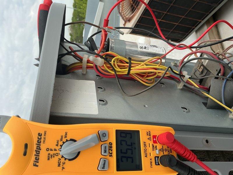 Completed comprehensive Comfort Plan clean and check service on single HVAC system including air handler and outdoor condensing unit. Performed electrical diagnostics using digital multimeter to verify proper voltage and amperage readings at outdoor unit components, tested capacitor function, and inspected all electrical connections and wiring for safety and proper operation. System operating within normal parameters upon completion of maintenance service.