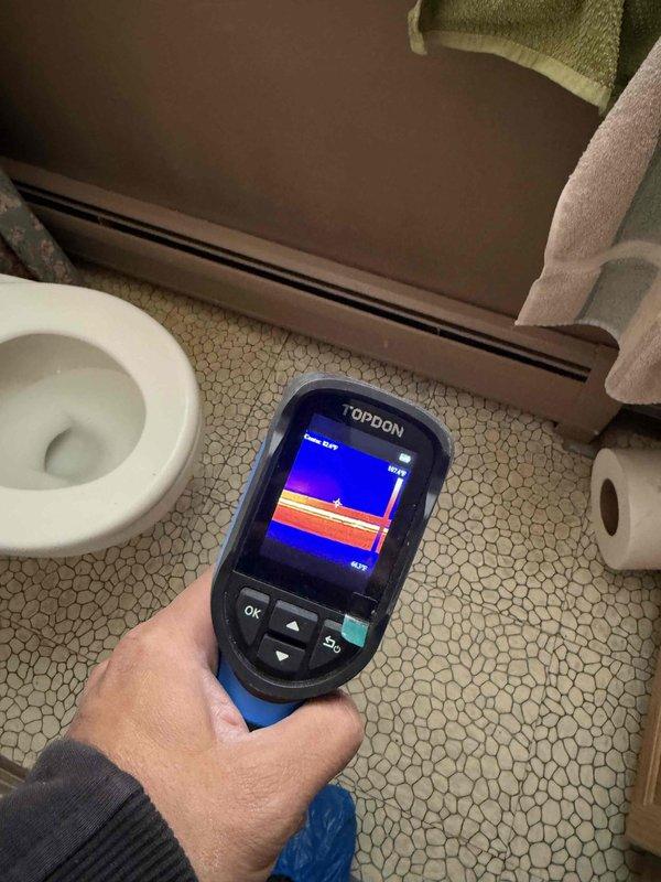 Responded to service call for furnace constantly running with suspected thermostat issue. Performed thermal imaging diagnostics of HVAC system components and surrounding areas to identify temperature differentials and system operation patterns. Utilized infrared camera to assess heat distribution throughout mechanical equipment and verify proper system cycling. Evaluated thermostat functionality after battery replacement had been attempted, conducted standard dispatch diagnostics, and documented equipment information for service records.