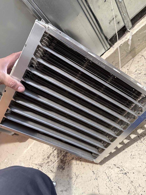 Completed spring clean and check on air conditioning system per comfort plan maintenance agreement. Removed and cleaned multiple HVAC air filters found in basement utility area, serviced return air grilles, and performed standard preventative maintenance inspection on cooling equipment. All components checked and system operating within normal parameters.