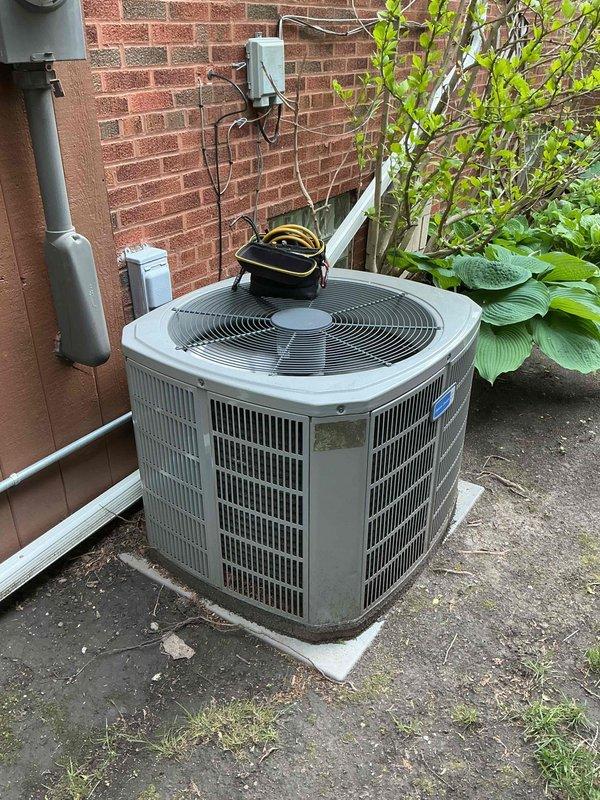 Completed annual Comfort Plan maintenance on 11-year-old single-zone air conditioning system with R-410A refrigerant. Performed comprehensive clean and check procedures on outdoor condenser unit and indoor air handler, including inspection of electrical connections, measurement of operating pressures and temperatures, verification of proper airflow, and cleaning of accessible components. Investigated customer concern regarding intermittent noise from furnace when AC operates; monitored system operation but noise was not present during visit. Reviewed customer-provided video documentation of the issue for future diagnostic reference. System operating within normal parameters at time of service, with refrigerant charge adequate following previous pound addition. Recommended continued monitoring of intermittent noise issue and advised customer to contact for service call if noise recurs for real-time diagnosis.