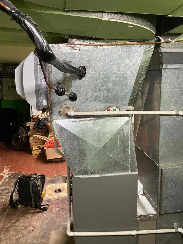 Completed annual Comfort Plan maintenance on 11-year-old single-zone air conditioning system with R-410A refrigerant. Performed comprehensive clean and check procedures on outdoor condenser unit and indoor air handler, including inspection of electrical connections, measurement of operating pressures and temperatures, verification of proper airflow, and cleaning of accessible components. Investigated customer concern regarding intermittent noise from furnace when AC operates; monitored system operation but noise was not present during visit. Reviewed customer-provided video documentation of the issue for future diagnostic reference. System operating within normal parameters at time of service, with refrigerant charge adequate following previous pound addition. Recommended continued monitoring of intermittent noise issue and advised customer to contact for service call if noise recurs for real-time diagnosis.