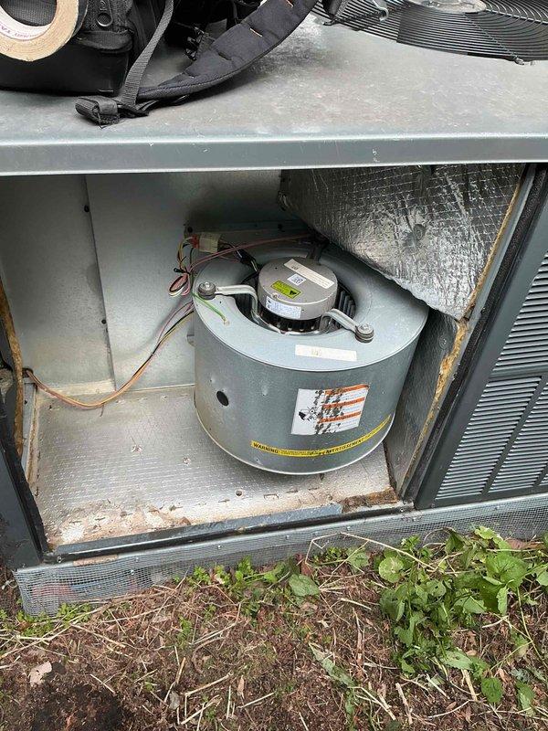 Performed blower motor cleaning on rooftop unit (RTU) at commercial property. Accessed internal compartment, removed accumulated debris from blower assembly and draft inducer motor, and verified proper operation upon completion. Collected outstanding balance for completed repair work.