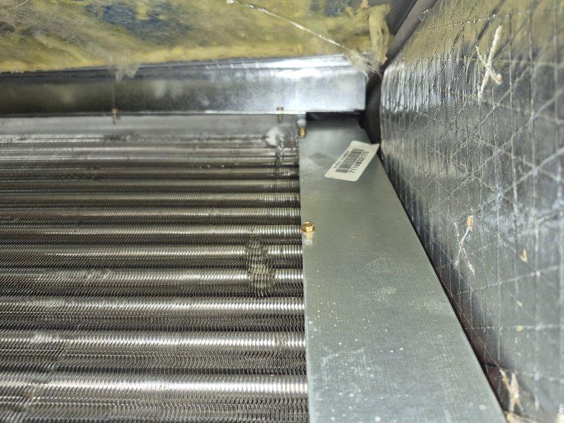 Performed routine air conditioning and air handler tune-up on single system. Inspected evaporator coil and internal components, confirming proper condition and operation. Replaced dirty 25x14x1 air filter with new unit to restore proper airflow and system efficiency.