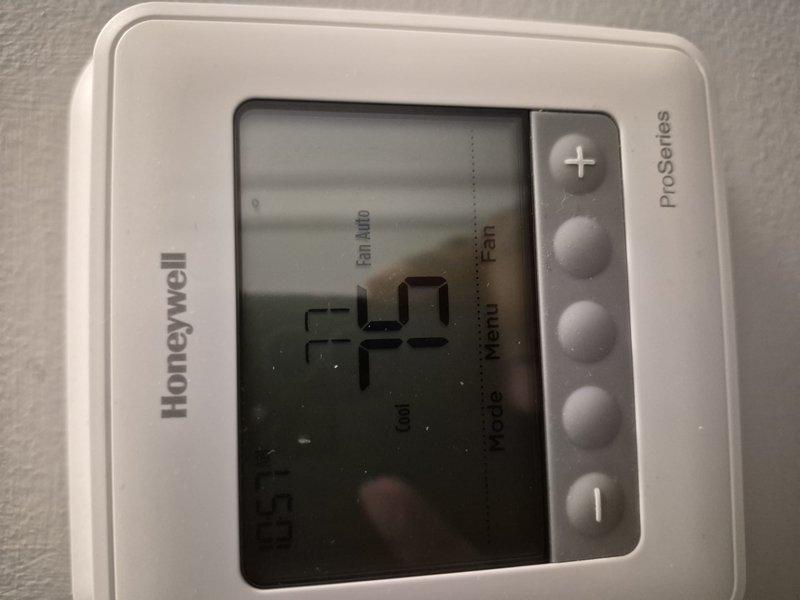Completed comprehensive tune-up and clean and check service on residential HVAC system. Inspected air handler components including blower assembly, evaporator coil, electrical connections, and capacitor for proper operation. Verified thermostat functionality with Honeywell ProSeries programmable unit displaying proper temperature readings and system controls. Assessed air filter requirement per customer request and replaced 12x20x1 filter as needed. All system components found operating within normal parameters with no deficiencies noted.