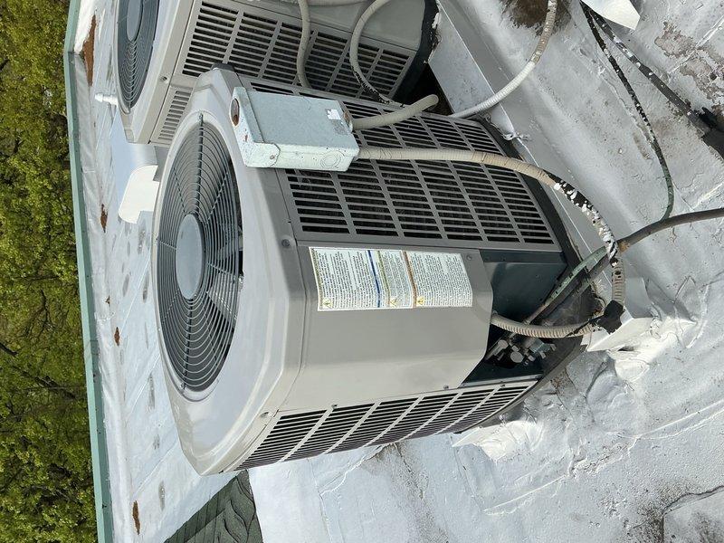 # HVAC Tune-Up Completed

Performed routine maintenance on rooftop air conditioning system. Discovered significant frost accumulation on evaporator coil and ductwork during inspection, indicating restricted airflow or possible refrigerant issue. Replaced air filter per maintenance protocol. Accessed air handler compartment to assess frost condition and performed necessary adjustments to restore proper system operation.