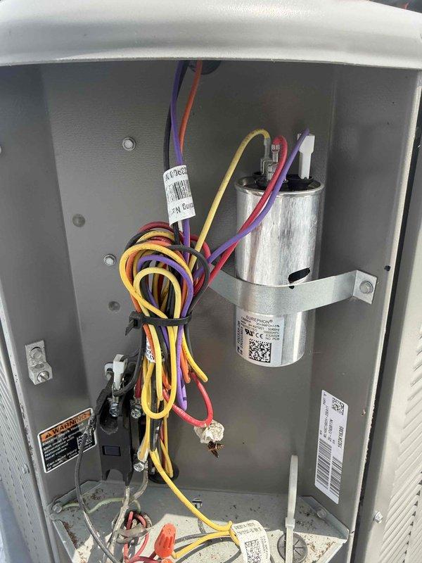 Completed preventive maintenance tune-up on rooftop HVAC system including air conditioning unit and air handler. Performed comprehensive system diagnostics using Fieldpiece SC260 multimeter, measuring capacitor performance at 435 microfarads to verify proper electrical operation. Replaced standard air filter with 16x20x1 filter, inspected electrical connections and wiring harness, and verified all components within manufacturer specifications for optimal system performance.