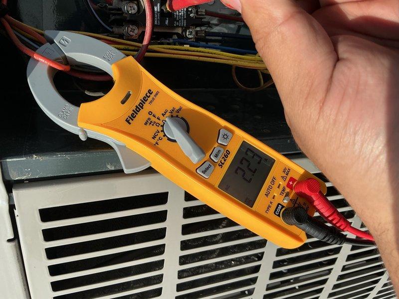 Completed standard tune-up maintenance on single HVAC system including air conditioning unit and air handler. Performed comprehensive system inspection, measured electrical amperage draw at 32.3 amps on compressor circuit, verified proper operation of contactor and electrical connections, and inspected all major components. Customer declined air filter replacement at time of service.