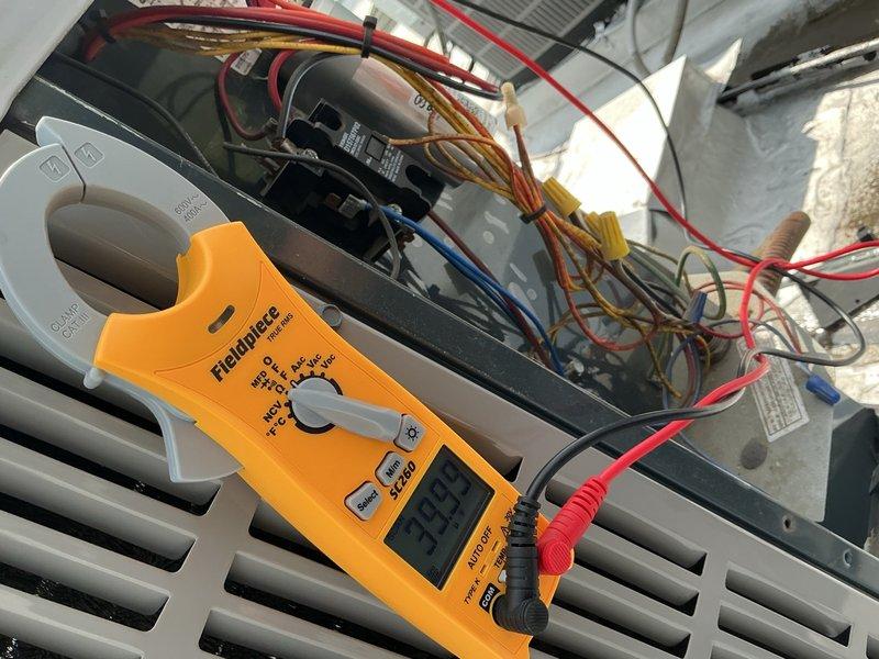 Performed comprehensive tune-up on single-system HVAC unit including air handler and condensing unit. Conducted electrical diagnostics using clamp meter, measuring amperage draw at 32.8A and verifying proper operation of capacitor, contactor, and all electrical connections. Replaced air filter and presented maintenance plan options to customer for ongoing system care.