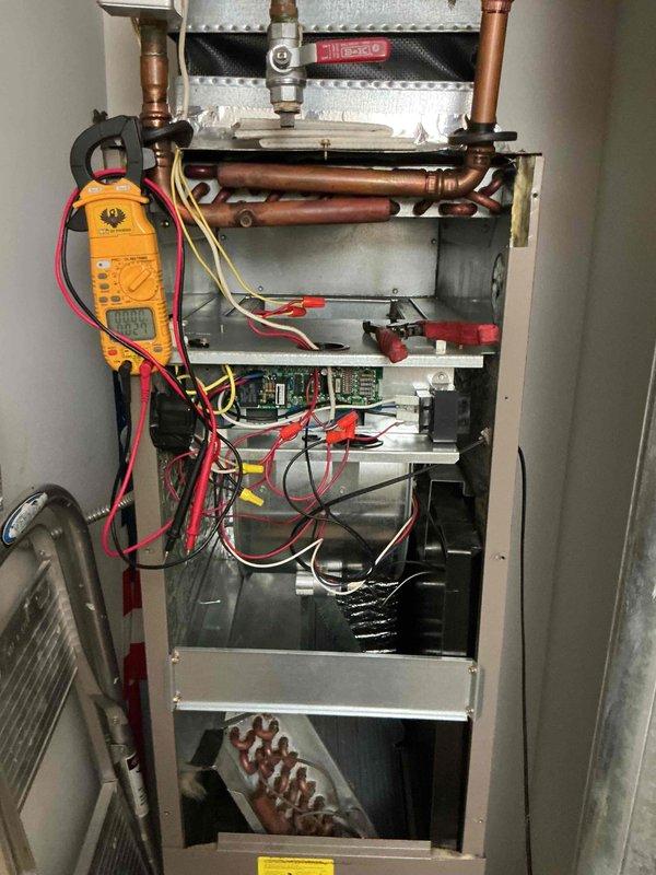 Completed spring tune-up maintenance on single-system rooftop HVAC unit. Performed comprehensive inspection of air conditioning condenser and air handler components, replaced 12x20x1 air filter, and conducted diagnostic testing with multimeter to verify proper electrical operation. All internal components including evaporator coil, control boards, wiring harnesses, and refrigerant lines inspected and found in good working condition.