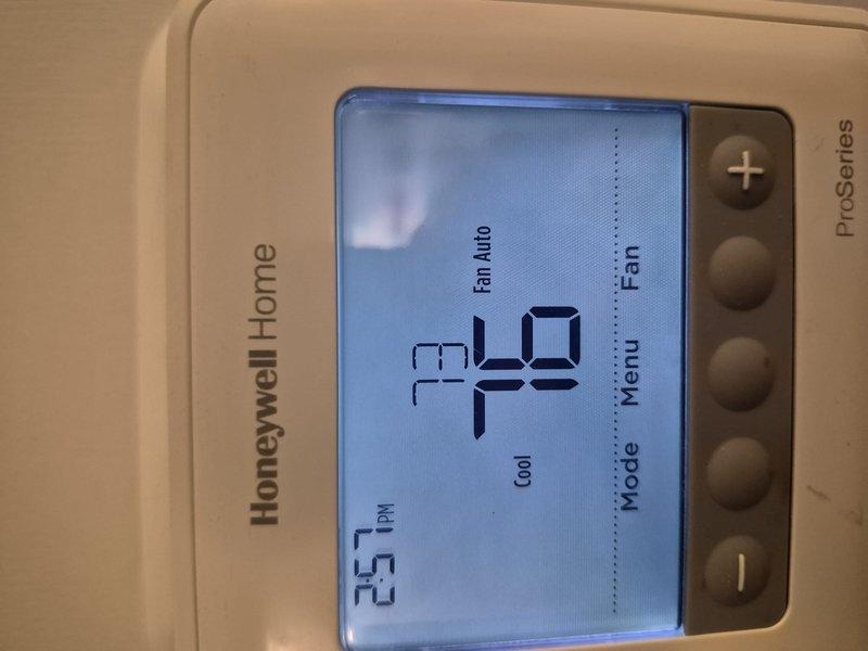 Completed comprehensive spring tune-up on single-zone HVAC system including air conditioning unit and air handler. Performed standard maintenance protocol, inspected capacitor and evaporator coil condition, replaced air filter, and verified thermostat operation with Honeywell ProSeries digital control displaying proper temperature settings in auto mode. System operating within normal parameters with all components functioning correctly.