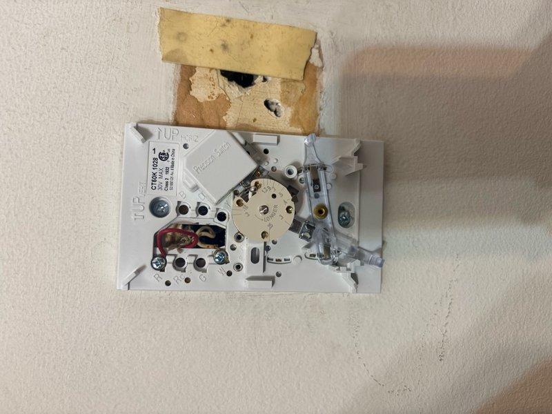 Completed return visit for no heat condition with thermostat replacement. Verified proper communication between new thermostat and boiler control board through multiple on/off cycling tests. Addressed uneven zone heating by cycling zone valve handle to restore hot water flow through copper piping, restoring proper heat distribution to all zones.