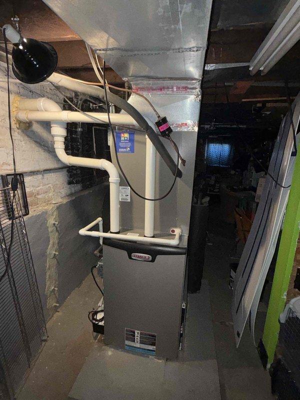 Completed comprehensive clean and check maintenance service on single HVAC system per Comfort Plan agreement. Performed thorough inspection of furnace unit located in basement mechanical room, verified proper operation of all components, inspected ductwork and ventilation connections, and confirmed air filter condition in return air assembly. All system components found operating within normal parameters with no deficiencies noted at time of service.