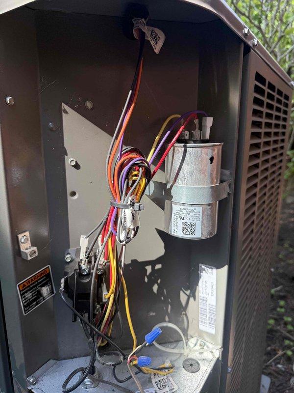 Completed preventative maintenance clean and check on residential air conditioning system per service comfort plan agreement. Performed comprehensive inspection of outdoor condensing unit including electrical connections, capacitor testing, and amperage verification. All components found operating within normal parameters with system drawing 124 amps and measuring 57.8 volts at time of inspection. Unit tested and left in proper working condition.