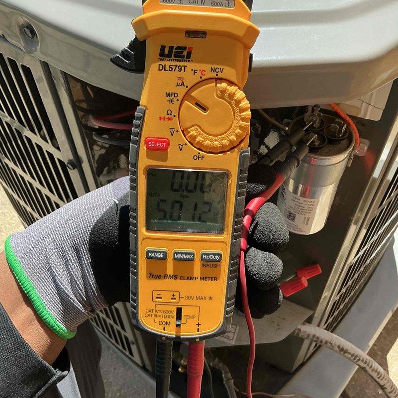 Completed air conditioning clean and check per Good Comfort Plan agreement. Performed comprehensive system inspection including electrical diagnostics with clamp meter, verifying voltage and amperage readings on unit components. Tested capacitor connections, control board wiring, and overall system operation to ensure proper performance and efficiency.
