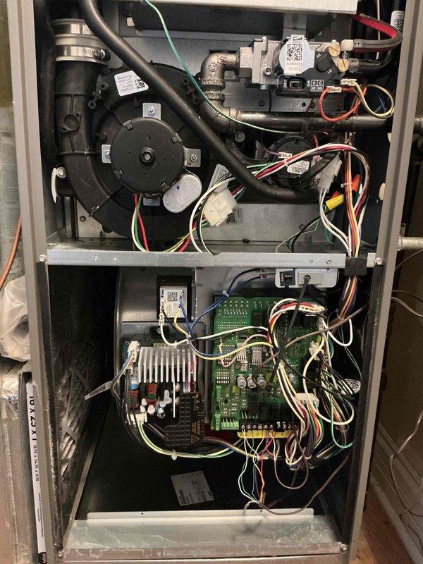 Completed preventive maintenance clean and check service on two HVAC systems per comfort plan agreement. Performed comprehensive inspection of indoor furnace unit, including blower motor assembly, gas valve, control board, and all electrical connections. Inspected outdoor condensing unit, verifying proper operation of dual capacitor, contactor, and condenser coil. All components found operating within normal parameters with no immediate service needs identified. Both systems tested and confirmed operational.