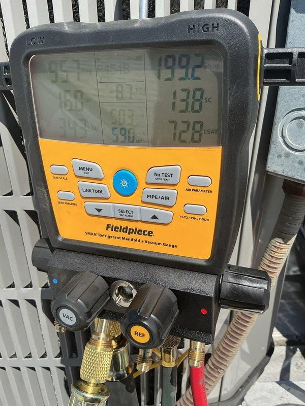 Completed warranty compressor replacement on HVAC system. Removed failed compressor from outdoor unit, verified proper refrigerant recovery, and installed replacement compressor with new accumulator. Conducted system pressure testing using digital manifold gauges, confirmed proper high and low side pressures, and verified all copper line connections were secure. Tagged defective compressor for warranty processing and shop return.