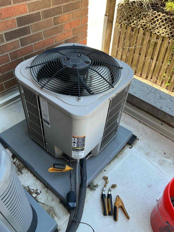 Completed comprehensive clean and check maintenance on two residential air conditioning systems as part of comfort plan agreement. Performed standard preventative maintenance procedures on 5-year-old outdoor condensing unit including inspection of compressor operation, refrigerant levels, and electrical connections. Cleaned condenser coils, checked fan motor operation, and verified proper airflow through unit. Inspected and tested electrical contactor for proper function, ensuring all contact points were clean and making solid connection. Verified amp draw on compressor and condenser fan motor within manufacturer specifications. All systems operating efficiently with no deficiencies noted at time of service.