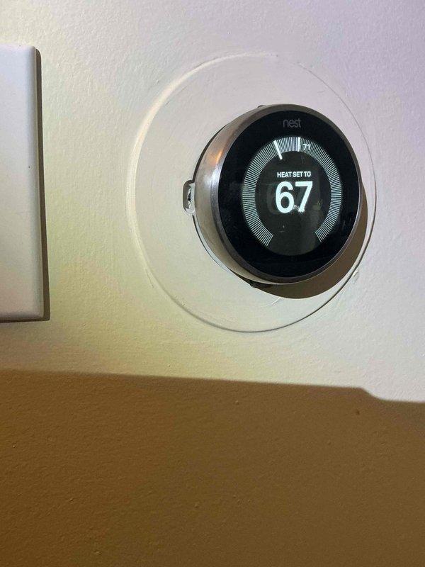 Completed Comfort Plan clean and check maintenance service on heat pump system. Performed comprehensive inspection of electrical control panel, verifying all wire connections, terminal blocks, and relay components for proper operation and secure mounting. Inspected blower motor assembly and associated HVAC refrigerant lines with mounting clamps. Confirmed Nest thermostat functioning correctly with heat mode set to 67°F and proper communication with system controls.
