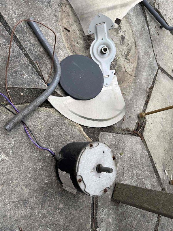 Replaced failed condenser fan motor on second floor HVAC unit. Removed old motor assembly, installed new motor with fan blades and protective guard, and completed electrical connections. System tested and verified operational upon completion.
