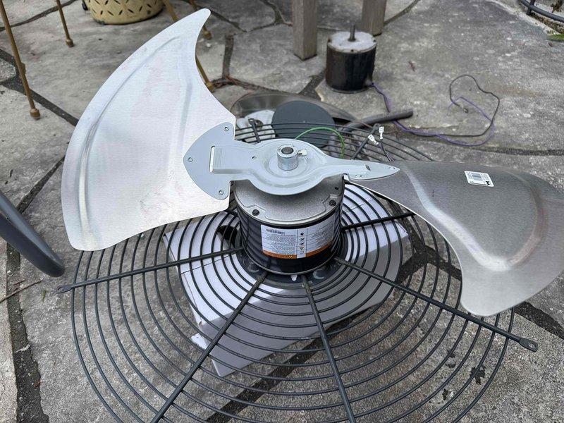 Replaced failed condenser fan motor on second floor HVAC unit. Removed old motor assembly, installed new motor with fan blades and protective guard, and completed electrical connections. System tested and verified operational upon completion.