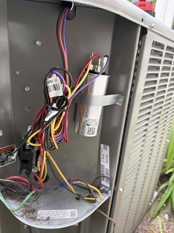 Completed Comfort Plan clean and check maintenance on single HVAC system. Performed comprehensive inspection of outdoor condensing unit, verified proper operation of CBB65A run capacitor rated at 440V 50/60Hz, inspected all electrical connections and wiring harness for secure terminations, and confirmed all components are functioning within manufacturer specifications. System is operating efficiently with no issues identified at this time.