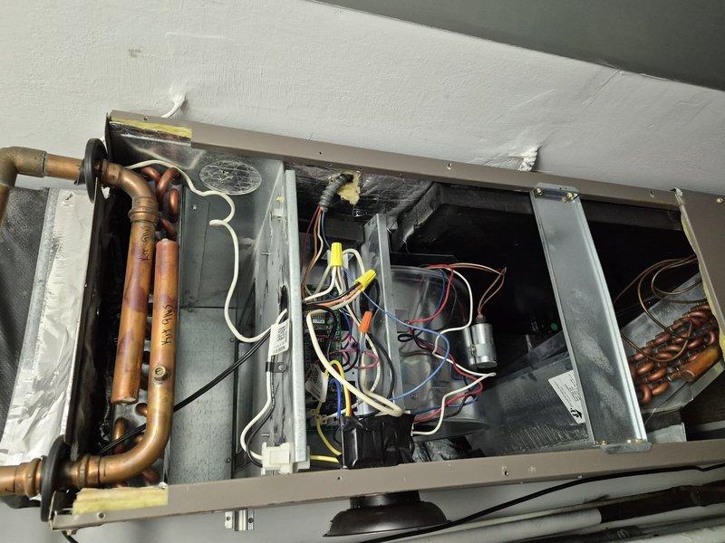 Completed warranty motor replacement on ADP air handler unit. Accessed internal compartment and removed failed blower motor assembly. Installed replacement motor, verified proper electrical connections and wire routing with appropriate strain relief. Confirmed secure mounting and alignment of motor within housing. Tested system operation to ensure proper airflow and motor function. Reinstalled access panels and verified all components secured. Returned defective motor to shop for warranty processing and documentation.