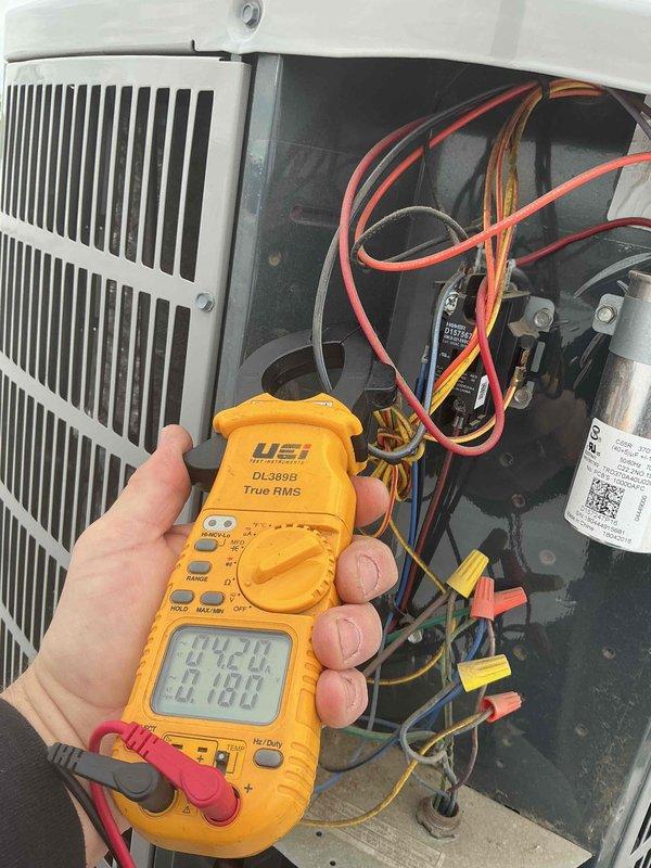 Completed preventive maintenance tune-up on single HVAC system. Performed comprehensive electrical diagnostics using digital multimeter to verify capacitor performance and system voltage readings. Replaced air filter and inspected all electrical connections, contactors, and components within condensing unit. System operating within normal parameters with all readings documented.