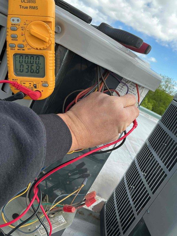 Completed preventative maintenance tune-up on single-system HVAC unit located on rooftop. Performed electrical diagnostics using digital multimeter to verify system performance and measure voltage/amperage at outdoor unit. Inspection of air handler revealed cracked blower wheel blade requiring customer notification for future repair consideration. Discussed air filter replacement options with customer for decision upon service completion.