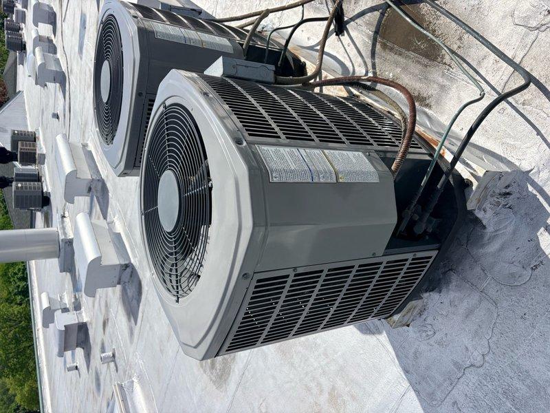 Completed comprehensive tune-up and maintenance on single HVAC system including both outdoor condenser unit and indoor air handler. Performed standard inspection of dual condenser setup on rooftop, checking refrigerant lines, electrical connections, and overall unit operation. Replaced air filter at indoor air handler location and verified proper airflow through ductwork and insulated components in confined access area.