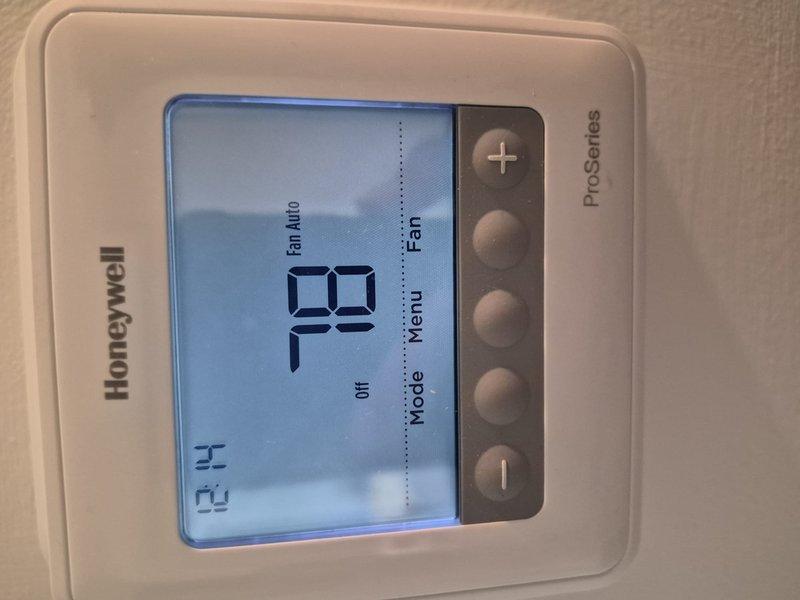 Completed clean and check maintenance on single-system air conditioning unit and air handler. Inspected outdoor condenser unit electrical components including capacitor and contactor, verified proper connections and functionality. Customer declined air filter replacement at this time. System operating within normal parameters with Honeywell ProSeries thermostat displaying proper function.