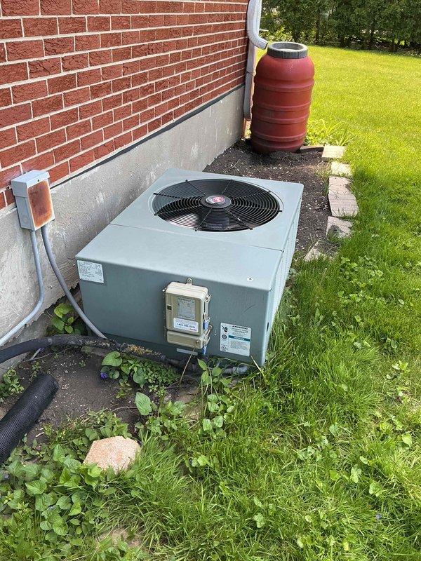 Completed Gold Comfort Plan clean and check service on 19-year-old air conditioning system. Performed comprehensive inspection of outdoor condensing unit, verified refrigerant line insulation integrity, checked electrical disconnect, and inspected unit mounting and drainage. Replaced 16x20x1 air filter at indoor air handler location. System operational at time of service. Noted age of equipment and recommended customer consider replacement options given unit is approaching end of typical service life, particularly with warm weather season approaching.