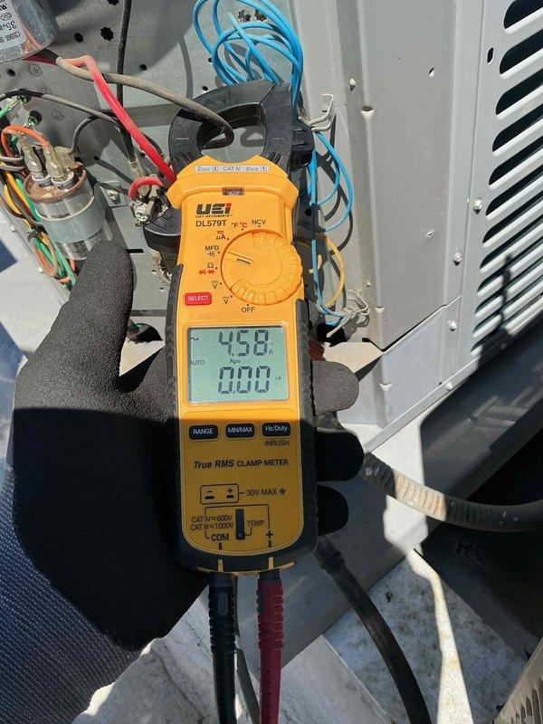 Completed comprehensive tune-up and clean-and-check service on single-system HVAC unit for new customer. Installed 12x20x1 air filter, performed electrical diagnostics using clamp meter showing 452V and 238.1V readings with 400-amp capacity verification, and inspected all system components including capacitor and wiring connections. Customer expressed interest in upgrading to large-display thermostat for improved readability.