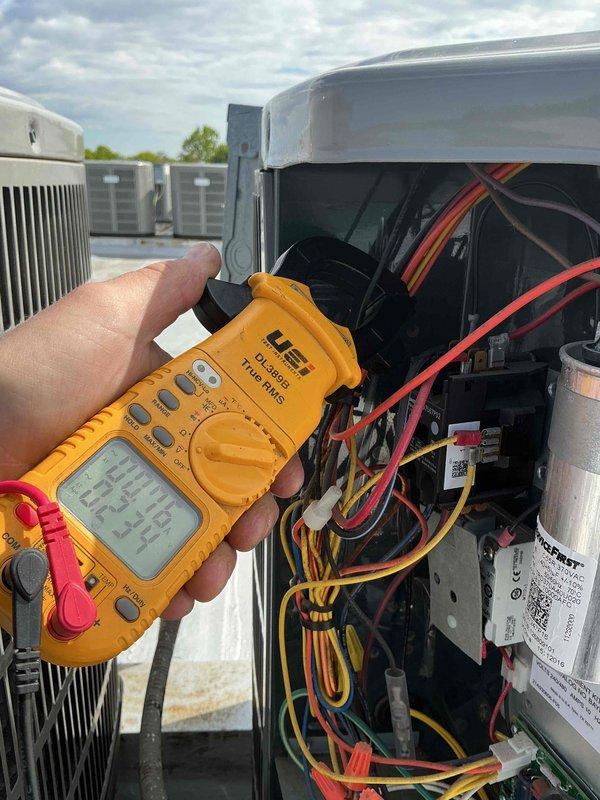 Completed comprehensive tune-up service on single HVAC system including air conditioning unit and air handler. Performed electrical diagnostics using digital multimeter to verify proper voltage and amperage readings at capacitor and control board connections. System found to be clean and operating within normal parameters; no filter replacement required per customer specification.