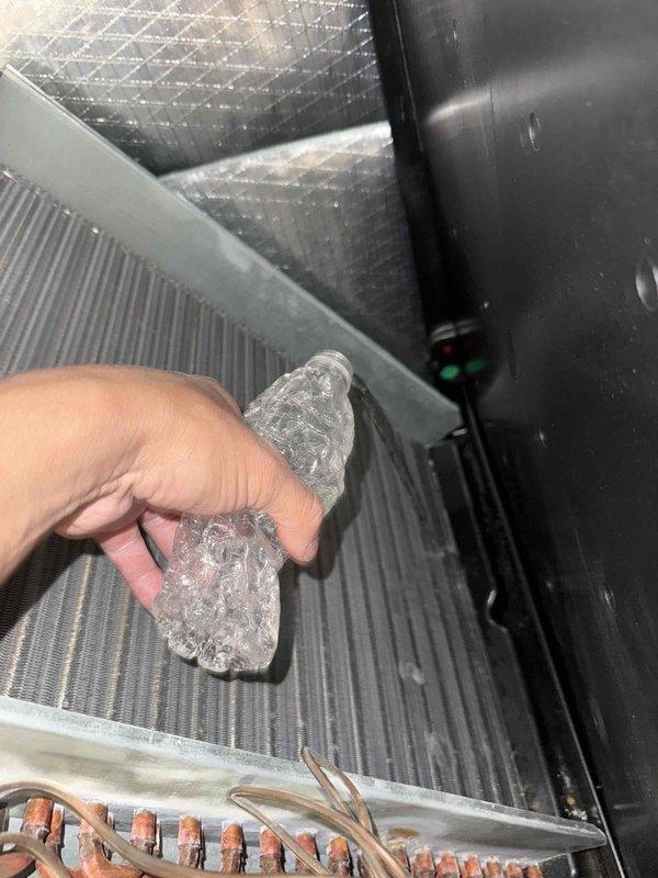 Completed routine AC and air handler tune-up on single-system residential unit. During inspection, discovered significant ice formation on evaporator coil, indicating potential airflow restriction or refrigerant issue. Performed standard maintenance procedures including filter replacement and system evaluation to address freezing condition and restore proper operation.