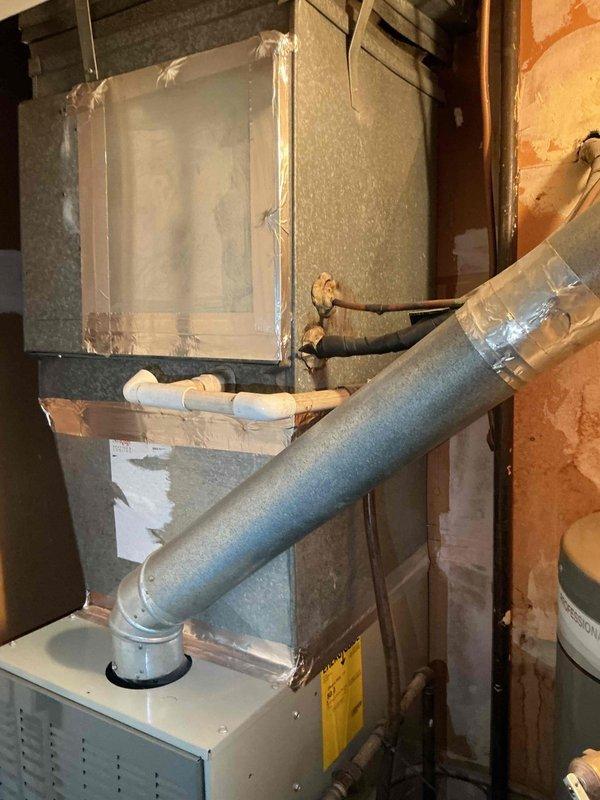 Completed annual Comfort Plan clean and check maintenance on single HVAC system. Performed comprehensive inspection of indoor air handler unit in basement mechanical room, examining ductwork connections, plenum assembly, and refrigerant lines. Inspected outdoor condenser unit on rooftop, checking compressor operation, condenser coils, and electrical connections. Verified proper system operation and refrigerant levels. All components found operating within normal parameters with no immediate service needs identified.